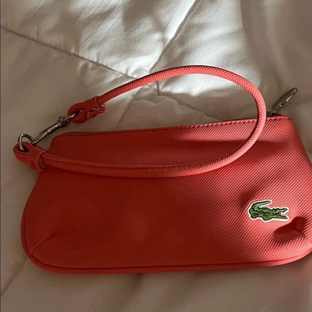 Coral color Lacoste Women's Vibrant Coral Wristlet